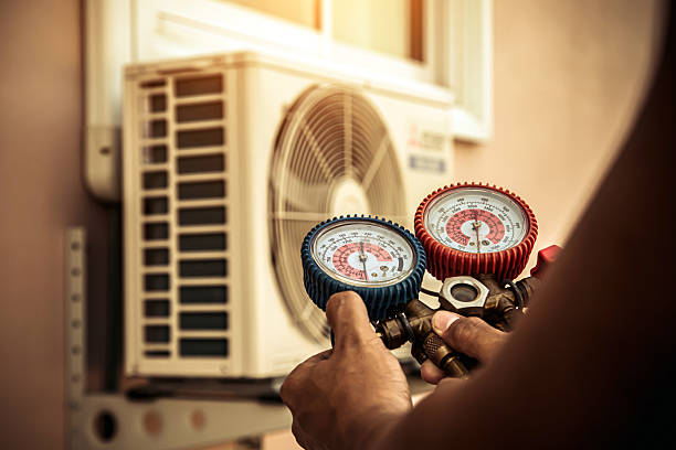 Professional Hvac technician working in Crownsville, MD